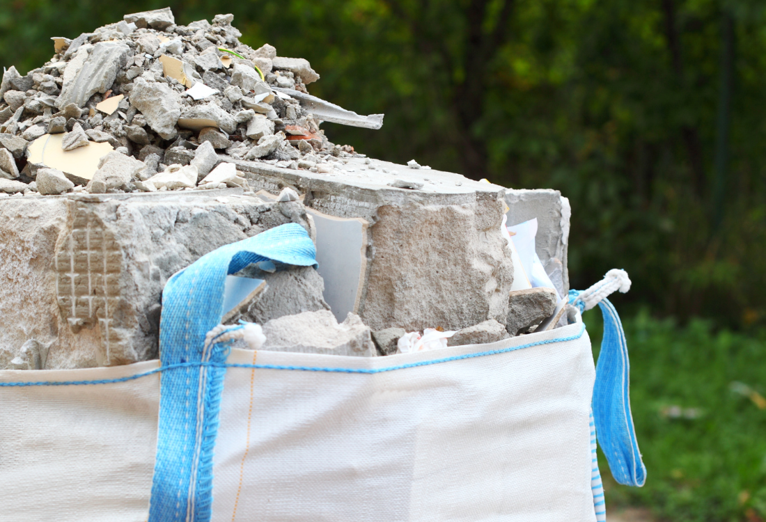 Builders bulk bags being used on a construction site for collection and removal of waste.