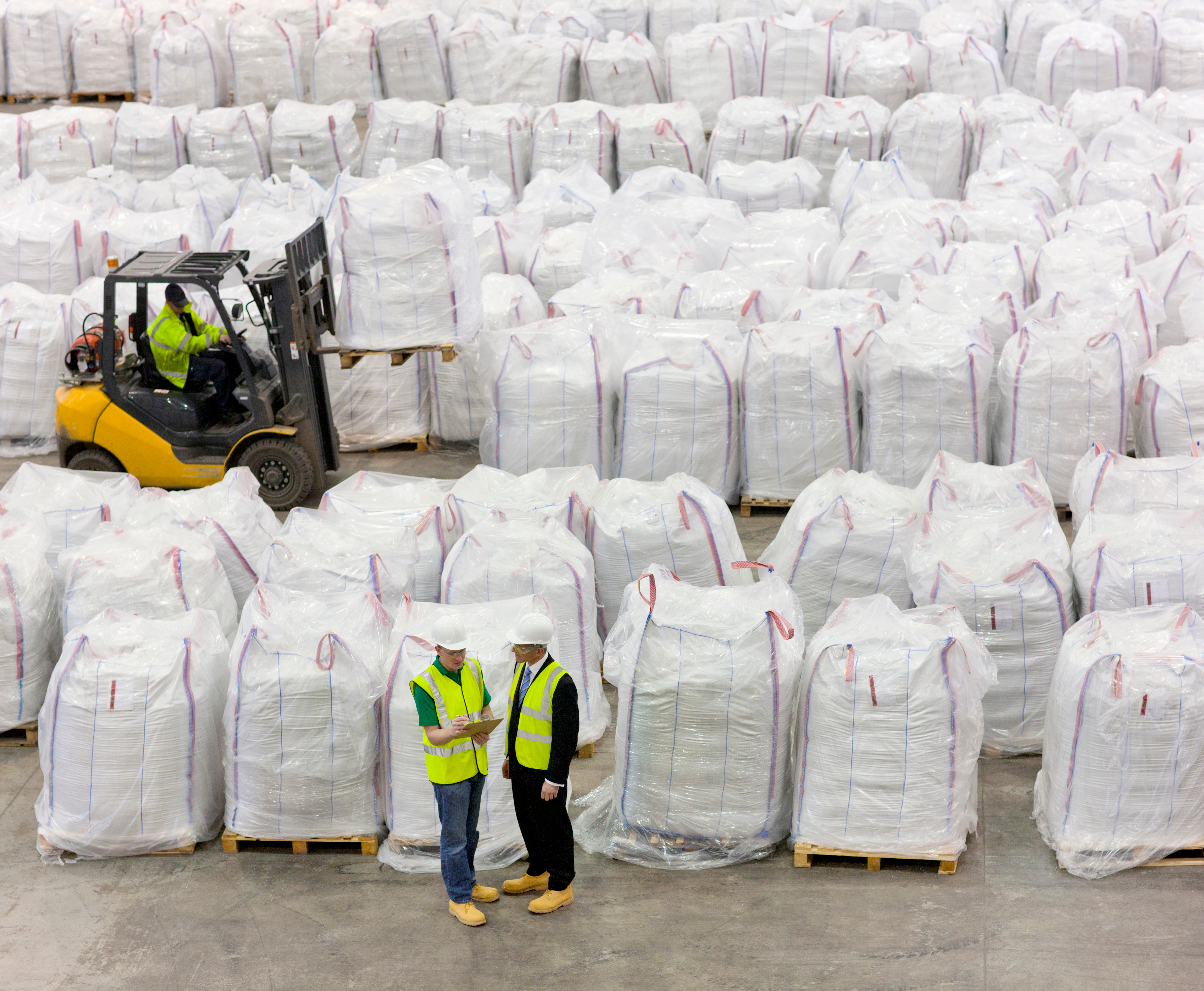 Warehouse storing bulk bags highlighting importance of bulk bag safety and proper FIBC stock rotation practices. 